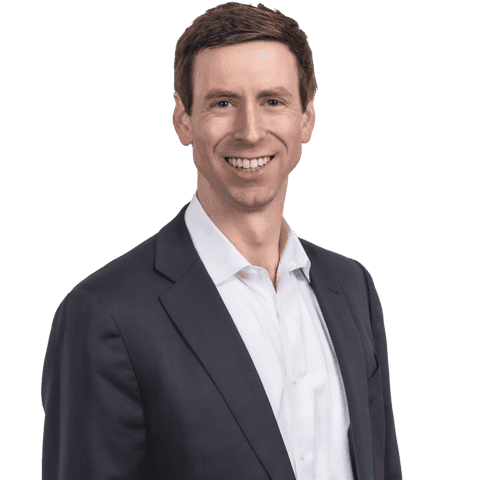 This is a profile image of Tom Brennan